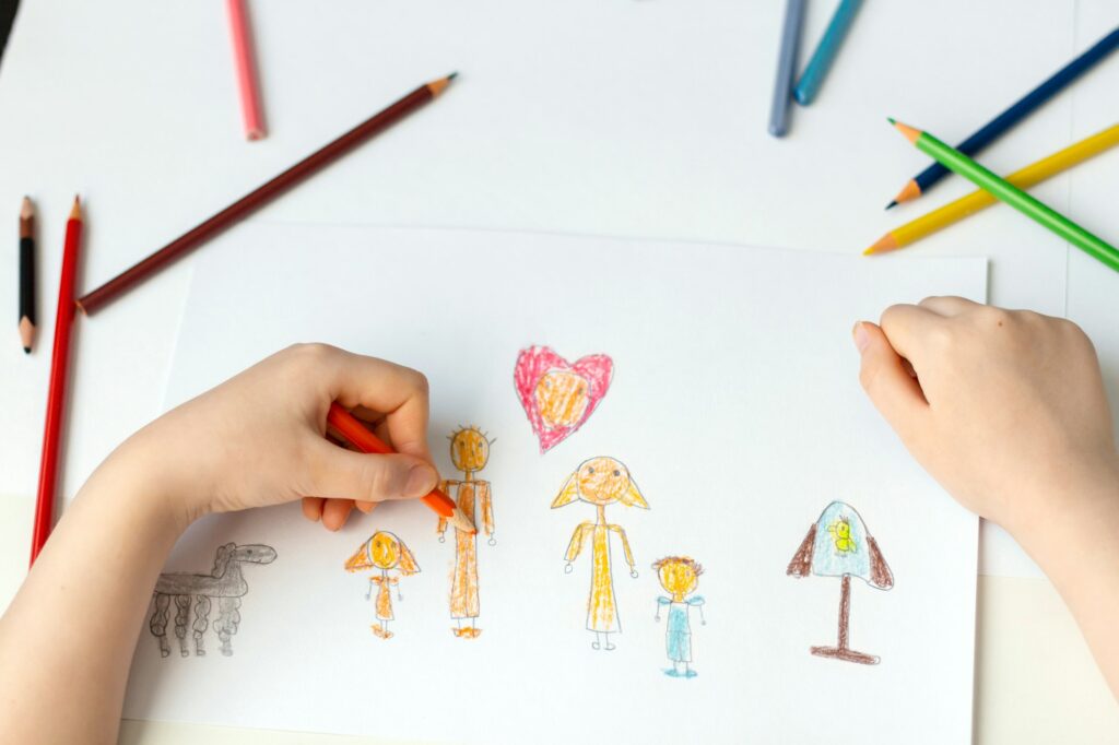 Kids drawing . Colorful painting of family.